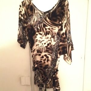 Beautiful Blouse with belt as shown by Venus